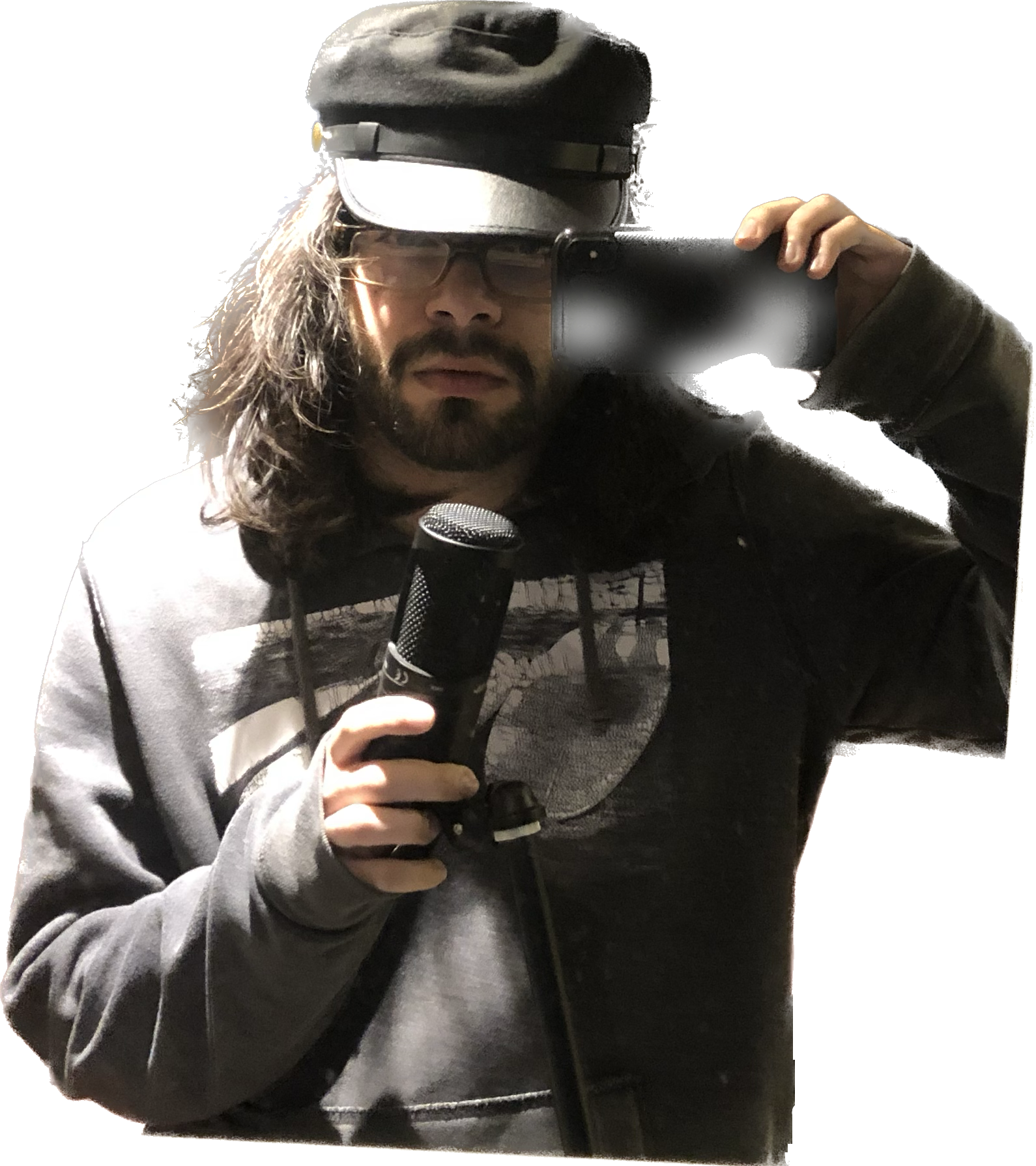 Rodmon holding a microphone and camera
